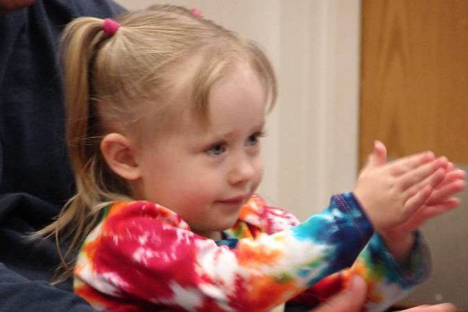 Child rubbing hands together