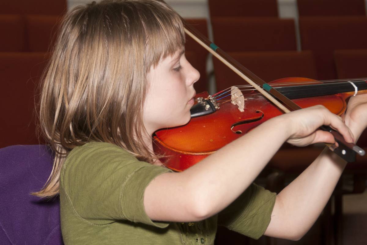 Child playing violin